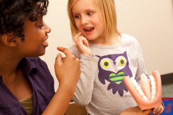 Speech therapist with child