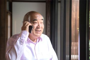 Chinese man on the phone