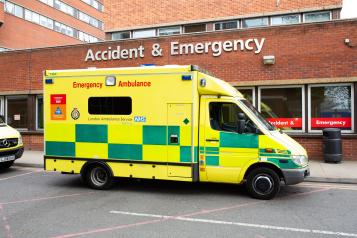An ambulance parked outside an Accident and Emergency Department of a hospital