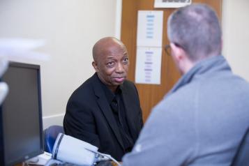 Doctor talking to patient 