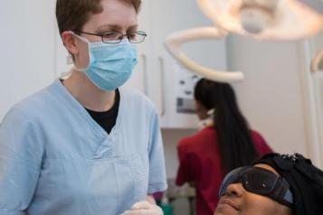 Dentist with patient