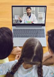 Mother and children talking to doctor via their laptop